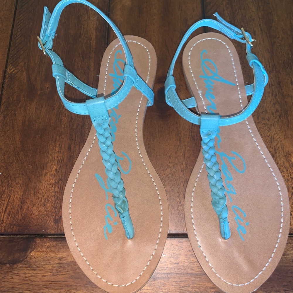 Never worn turquoise American Rags sandals